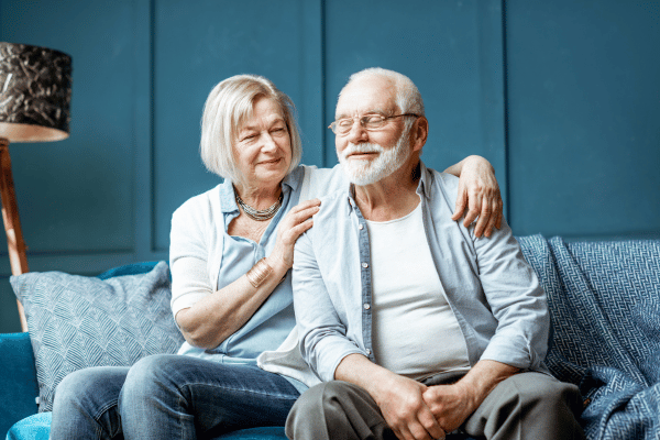 Senior couple sitting on a sofa | Waypoint Converts